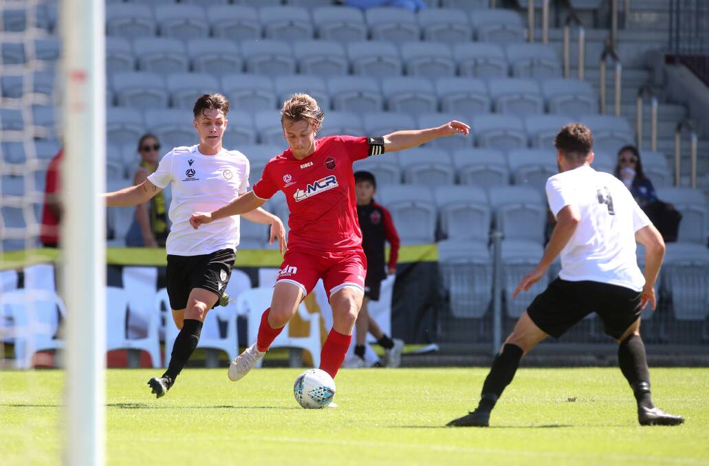 Denied: Wolves' key man Lachlan Scott, pictured against Northbridge, was unable to find the winner in Sunday's clash with Sydney United. Picture: Sylvia Liber