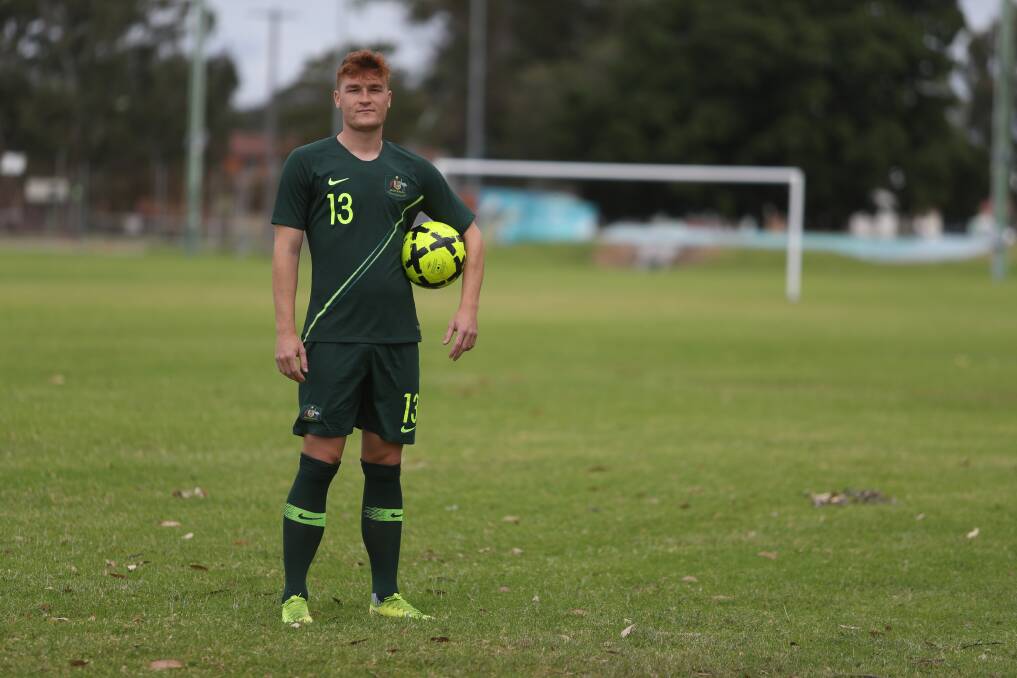 Green and bold: Phillip Cancar, at Unanderra Hearts' ground on Monday, is eyeing the under 20 World Cup with the Young Socceroos. Picture: Robert Peet