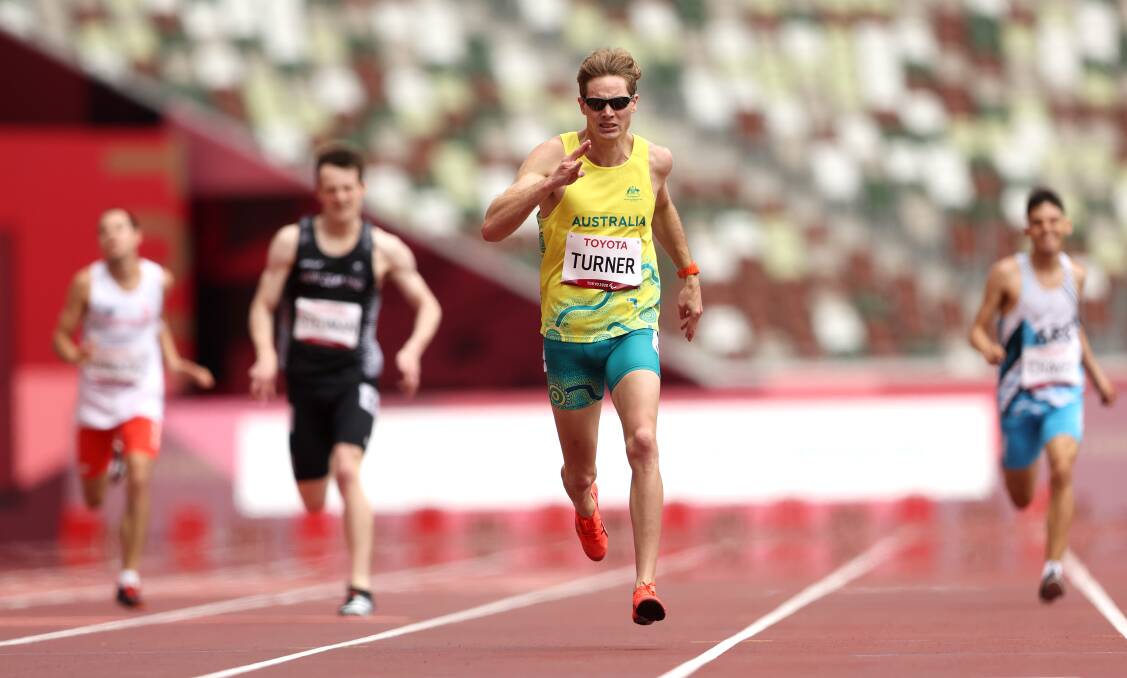 Hit the line: James Turner on his way to winning T36 400m gold in Tokyo on Tuesday. Picture: Kiyoshi Ota/Getty Images
