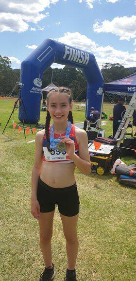 Fast finish: Charlize Colwell after the under 14 para girls event. 