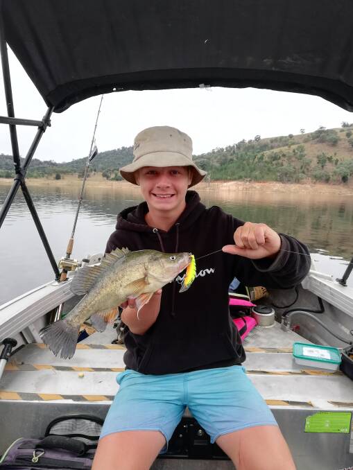 Success: Mason Norval with his golden perch capture at Wyangla Dam.
