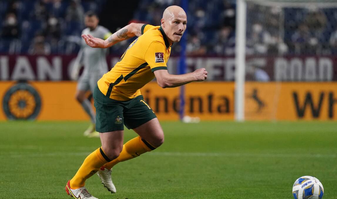 Green and bold: Aaron Mooy. Picture: Etsuo Hara/Getty Images