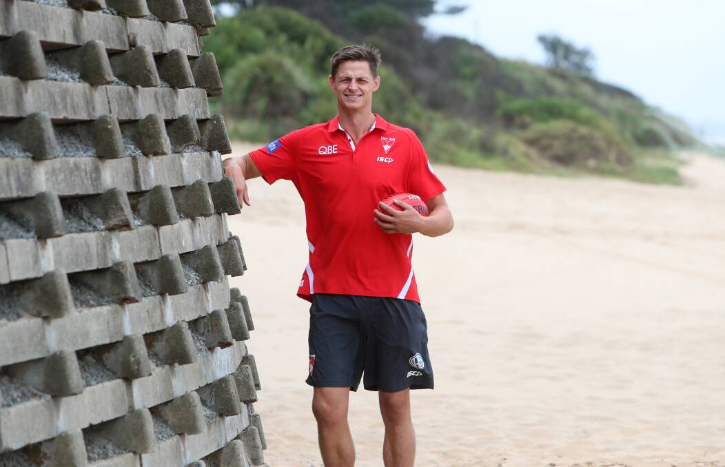 Build the wall: Callum Sinclair at North Wollongong Beach on Wednesday, during a two-day community camp in the Illawarra. Picture: Sylvia Liber