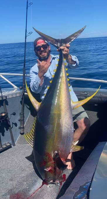 Reel it in: Matty Bates with a solid yellowfin tuna.