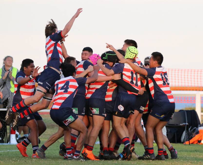 Celebration: University's under 17 players react after winning the grand final. Picture: FMB Photography