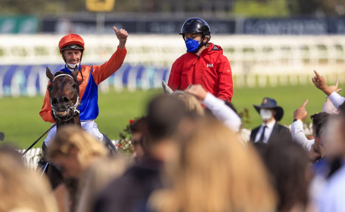 Thumbs up: Nash Rawiller after winning the Rosehill Gold Cup. Picture: Mark Evans/Getty Images