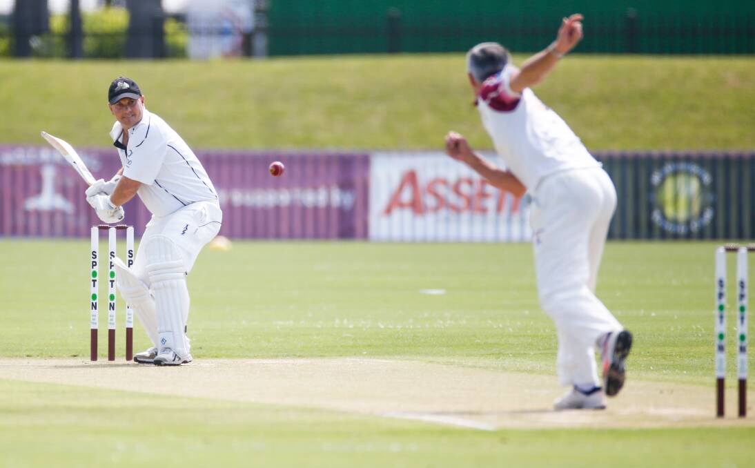 Watchful: Rob Fisher on his way to a half-century against Wollongong at North Dalton Park. Picture: Anna Warr