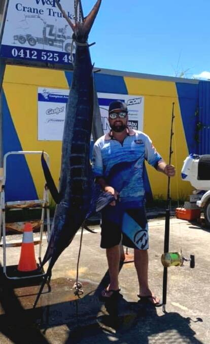 Super catch: Wayne Bush with his first striped marlin of 70-kilograms plus. 