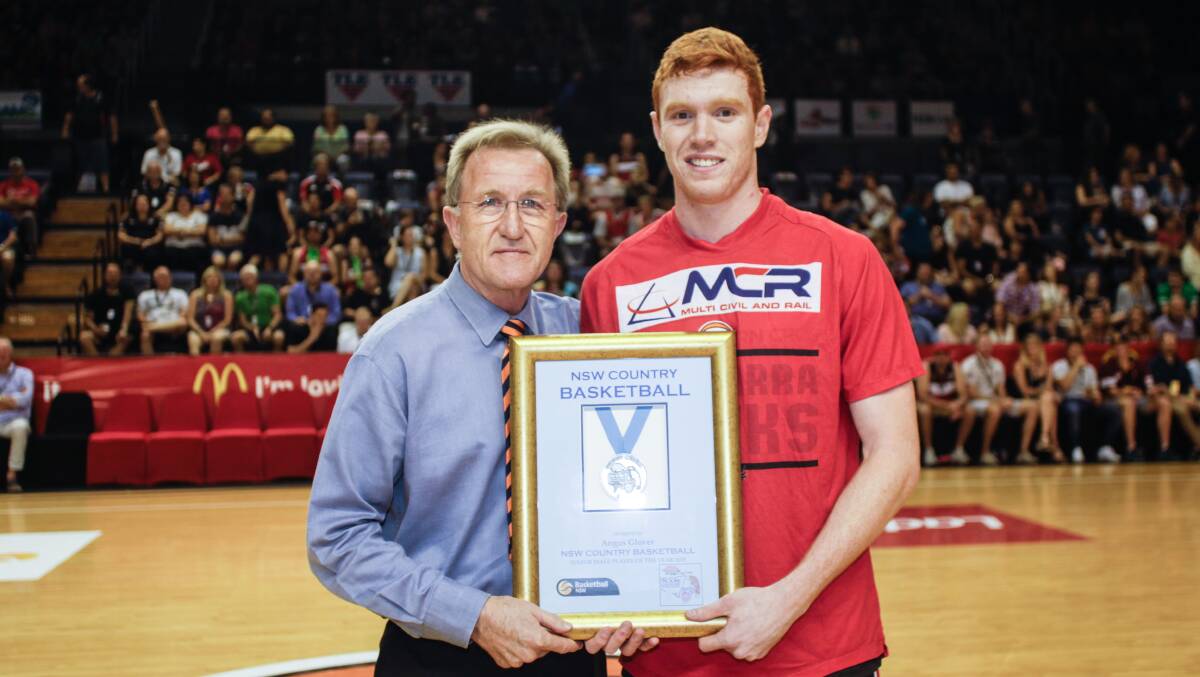 Talent: Hawks great Gordie McLeod with Angus Glover. Picture: Georgia Matts