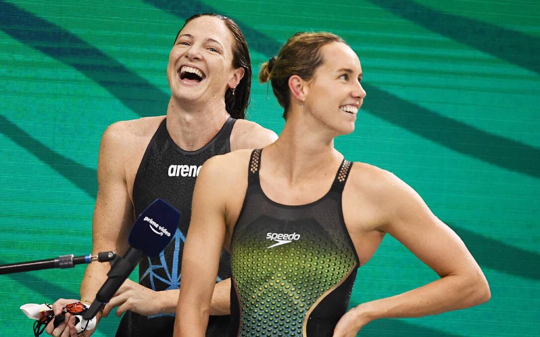 Laughing matter: Cate Campbell and Emma McKeon chase Olympic success at Tokyo later this month. Picture: Mark Brake/Getty Images
