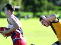 On the run: Wollongong Bulldogs Christian Foster is under pressure against Northern Districts earlier this season. Picture: Sylvia Liber
