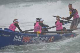 Moruya/Long Reef rows into shore after winning the first leg of the women's open division of the 2016 George Bass Surfboat Marathon. 