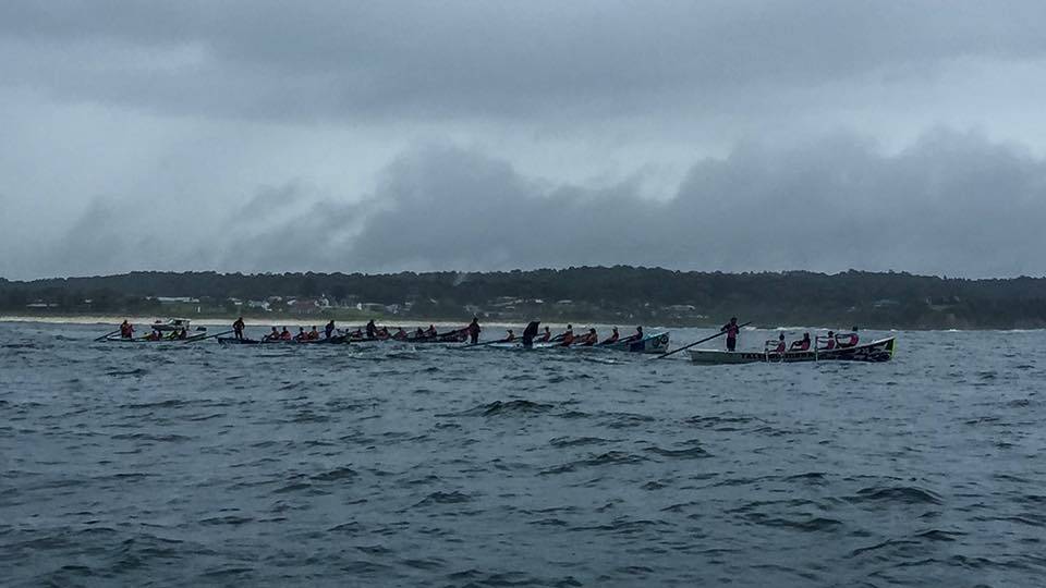 A bunch of surfboats leave Bermagui for the turning marker near Mystery Bay on the fourth leg of the George Bass Surfboat Marathon. Picture: Stan Gorton.