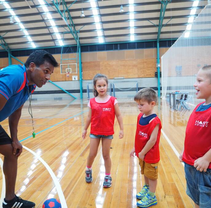 Sporting fun: Joe Orlandi with kids at Northcott Sports Academy. This new sports program gives parents and carers a chance to see kids with a disability shine.