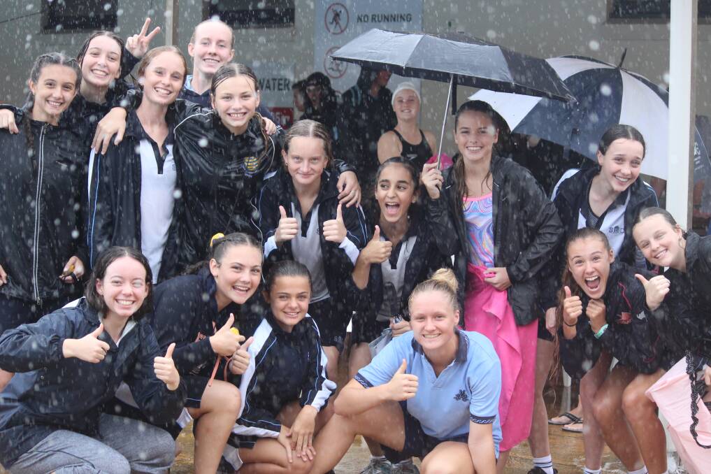 WINNERS: St Mary’s wet and smiling swimmers and helpers at the Diocesan Swimming Carnival where they won the 2017 Wollongong Diocesan Girls Swim Trophy.