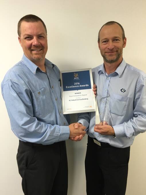Excellence: HVTC field officer, Michael Ruddock, with Adam Oswald, general manager at KJ Industrial Scaffolding with the Host Innovation award.
