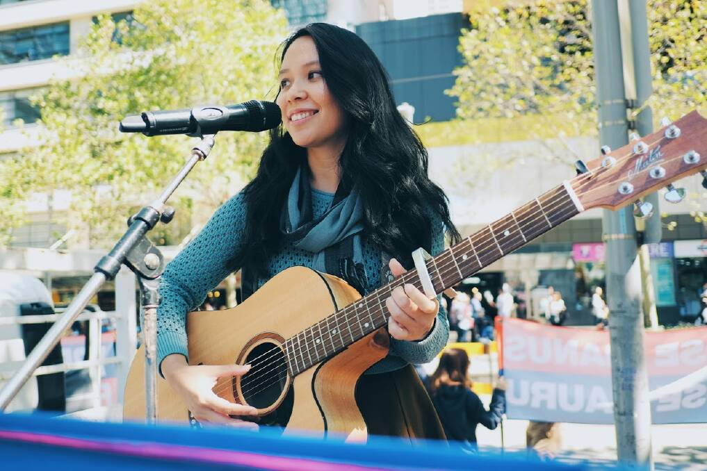Supporting refugees: Melbourne singer-songwriter Celine Yap will host a 'Songs for Refugees' concert on Saturday at 1pm at Folk By The Sea in Kiama.