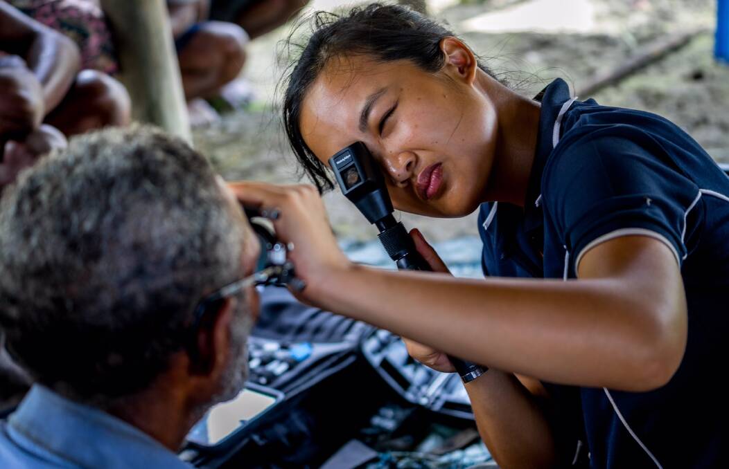Eye care for everyone: Optometrist Katherine La from Specsavers Wollongong recently travelled to Papua New Guinea offering eye examination and spectacle correction in remote communities.