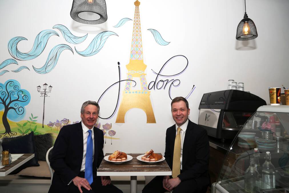 After months of entries and judging, the awards are finally here: IMB Bank chief executive Robert Ryan and Illawarra Business Chamber executive director Adam Zarth get into the Parisian theme at Zanders Keiraville. Pic: Greg Ellis.