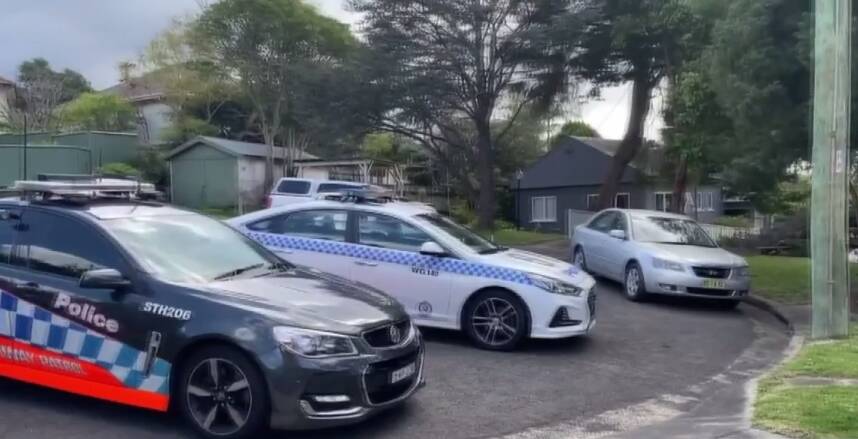 Police cars converge on a home in Mavis Grove, West Wollongong, during Tuesday's chase. Picture: WIN News