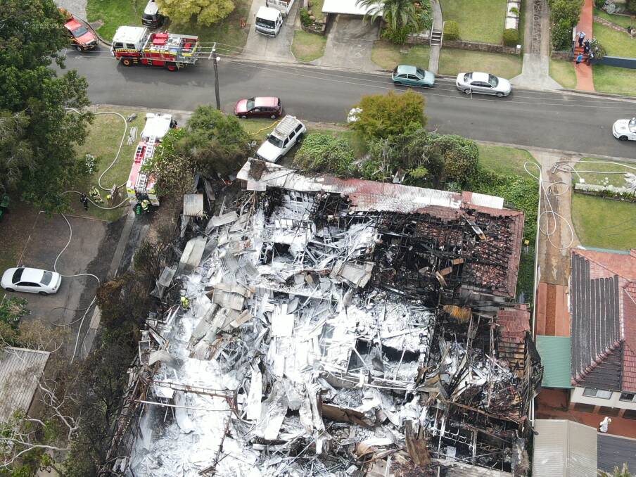 A layer of firefighting foam covers the gutted property on Thursday morning. Picture: supplied 