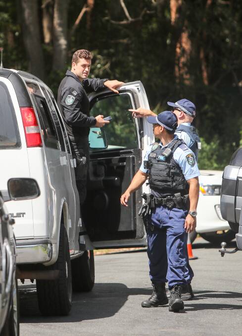 Specialist police arrive at the Cater Street roadblock. Pictures: Adam McLean 