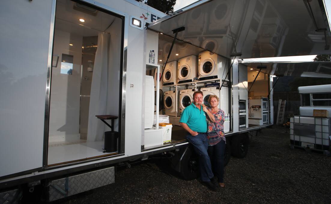 Bellambi volunteers Hamilton and Susan Gervaise have put their hearts, souls and wallets into the Fresh Start Trailer, which provides amenities to the homeless on Burelli St on Friday nights. Picture: Sylvia Liber 
