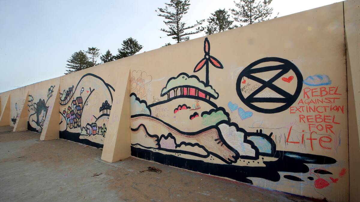 'Not approved' Wollongong council paints over mother of all murals