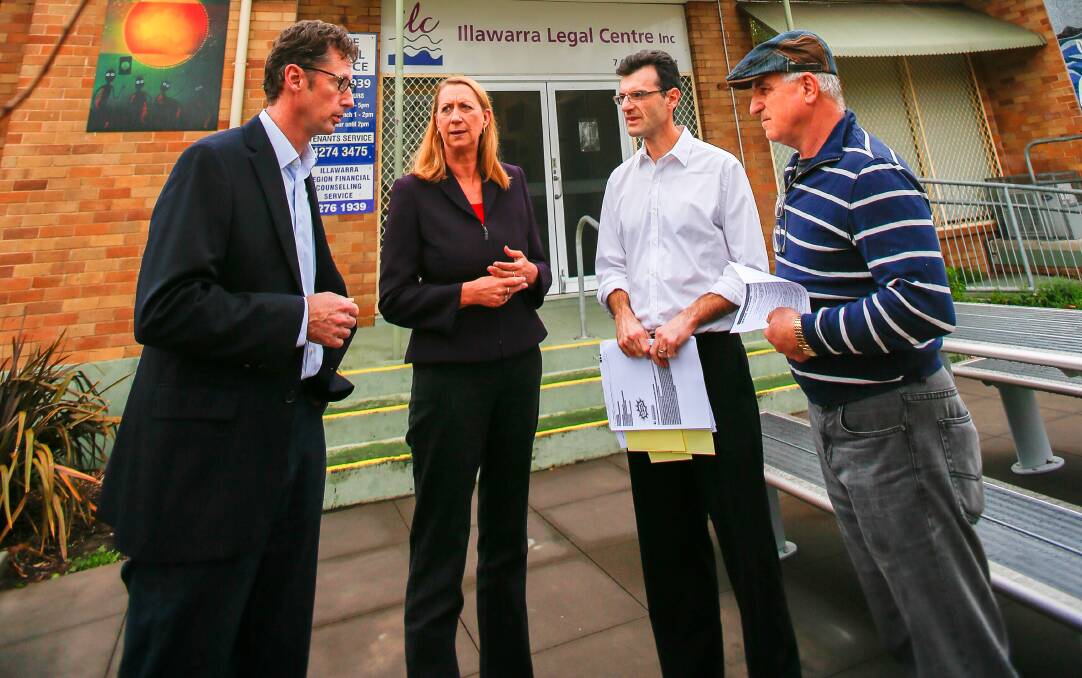 Throsby MP Stephen Jones and Cunningham MP Sharon Bird with Phillip Dicalfas and Maroun Germanos from the Illawarra Legal Centre in Warrawong at Saturday's funding announcement. 