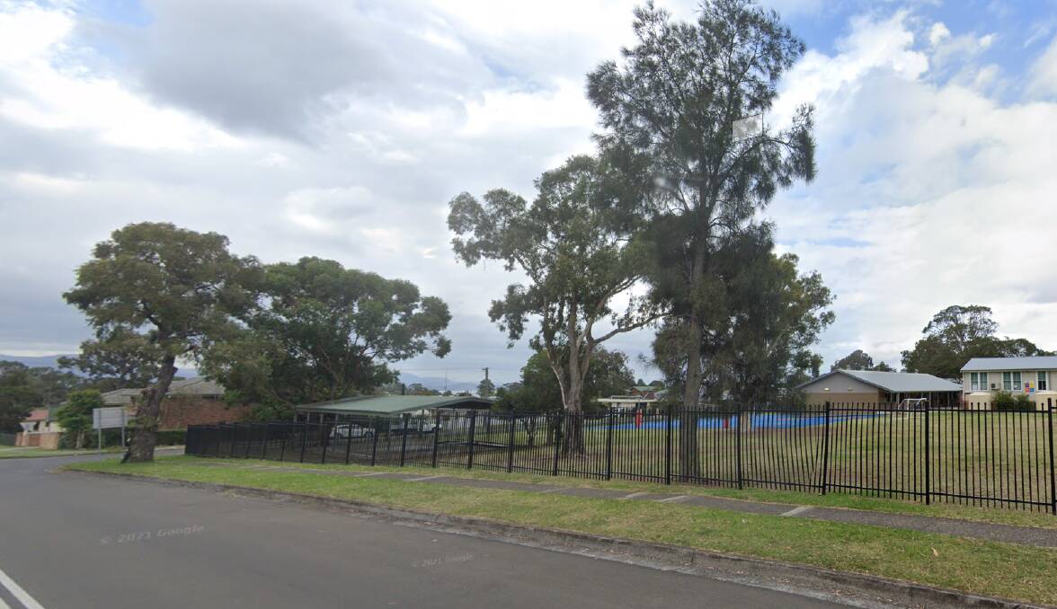 Paramedics were called to Moore St, outside Oak Flats Public School, about 3.05pm Tuesday. Picture: Google Maps 