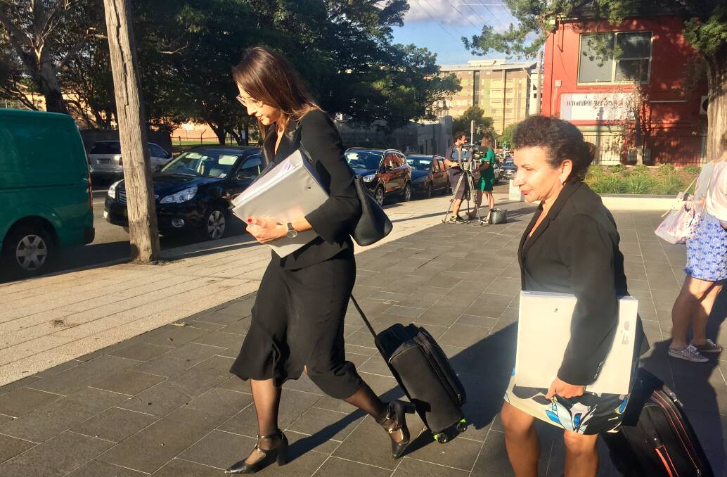 CROWN CASE: Crown prosecutor Emiljia Beljic (left) departs Wollongong courthouse following Wednesday's application. 