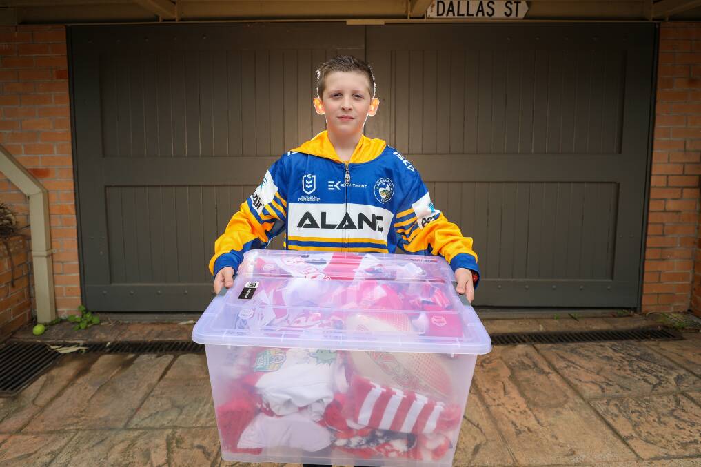 Oliver has packed all his Dragons gear away in a cupboard. Picture: Adam McLean 