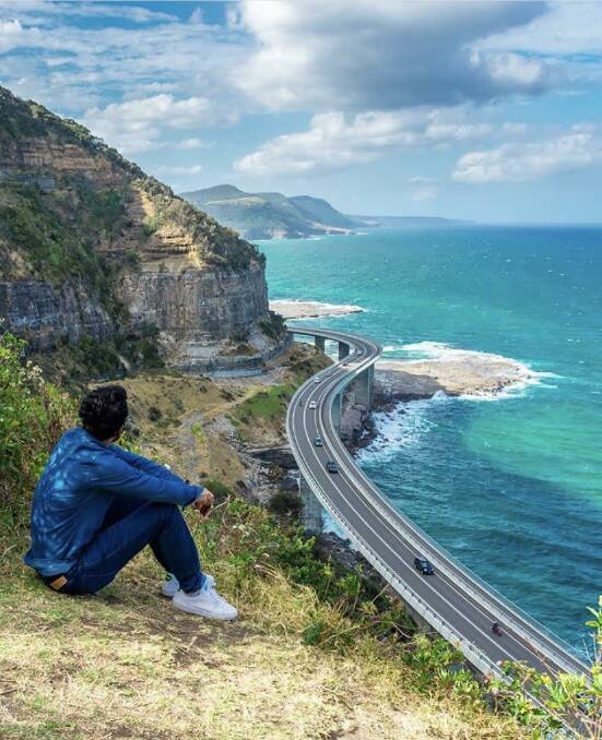 A man is shown taking in the view in one of thousands of pictures of the vantage point posted to Instagram. 