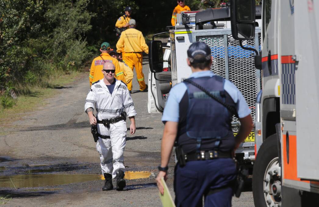 Emergency services converge on the search area at Bundeena. Picture: John Veage