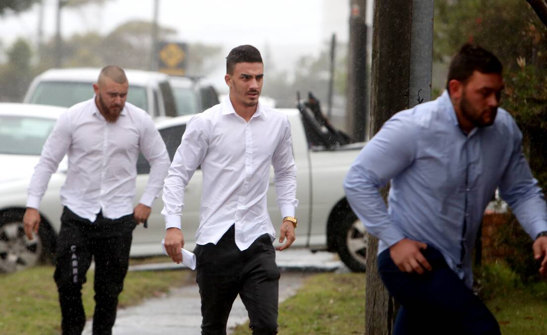 Jaiden King, Aaron Sultana and Nicholas King arrive at court, Wednesday. 