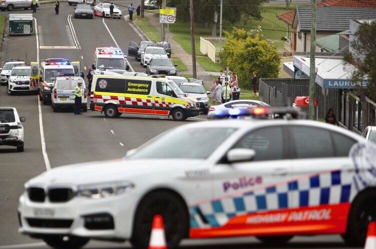 Accident scene: A police car cordons off the road where Bailey was fatally injured. 