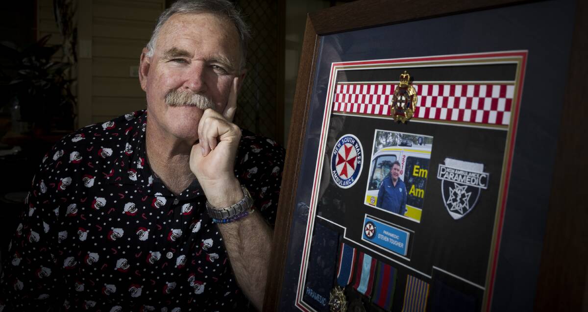 Jeff Tougher is pictured with medals and keepsakes belonging to his son, Steven Tougher, at his Bulli home on December 22, 2023. Picture: Anna Warr