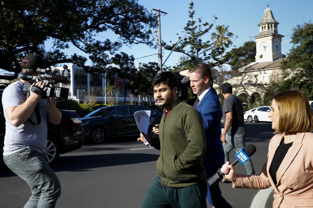Nasir departs Wollongong Police Station after being released on bail in September. 