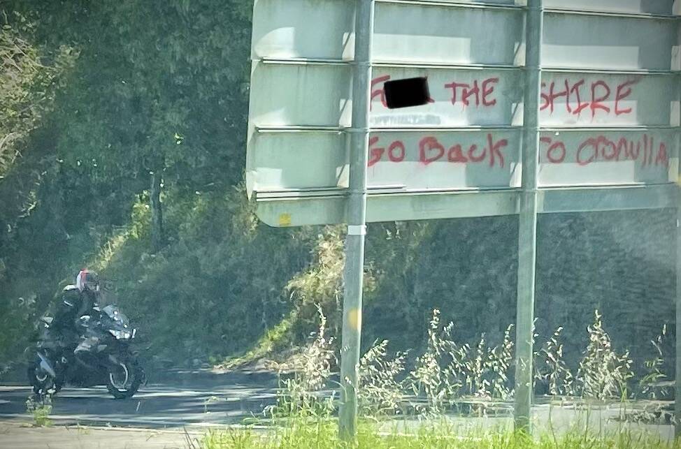 Another roadside message on Bulli Pass tells passing motorists: "go back to Cronulla". 