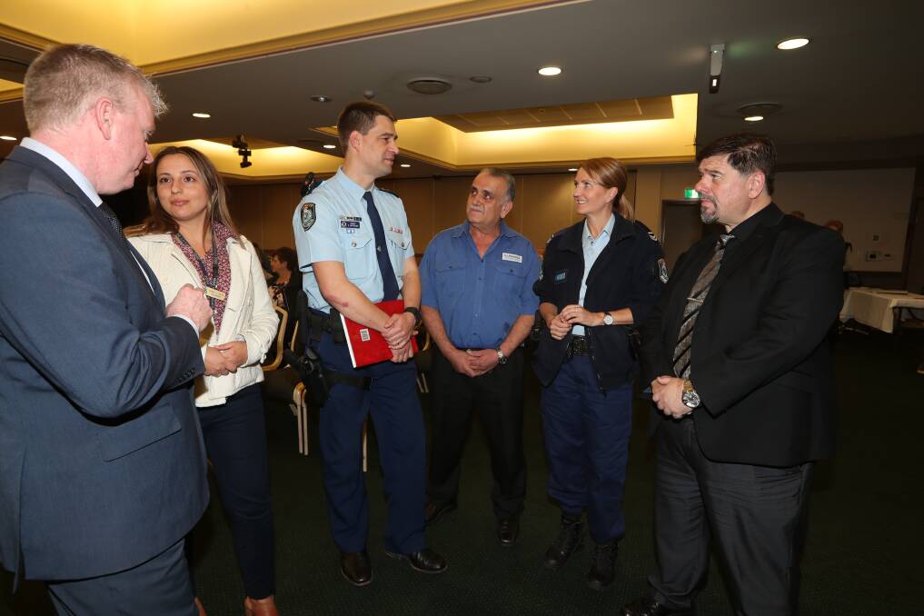 NSW Taxi Council's Martin Rogers, Rima Elhage, Acting Insp Charles Hutchins, Mahamad Choubassi, Sen Con Sharon White and Illawarra Taxi Network GM John Meagas-General. 
