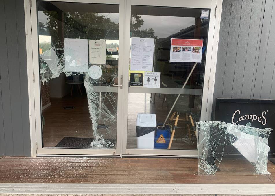 The door at Bean Roasted was destroyed and the business upended, costing a half-day's trade. Picture: supplied