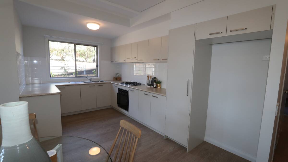 The kitchen to one of the ground-floor units at the new Corrimal community housing development. Picture: Robert Peet 
