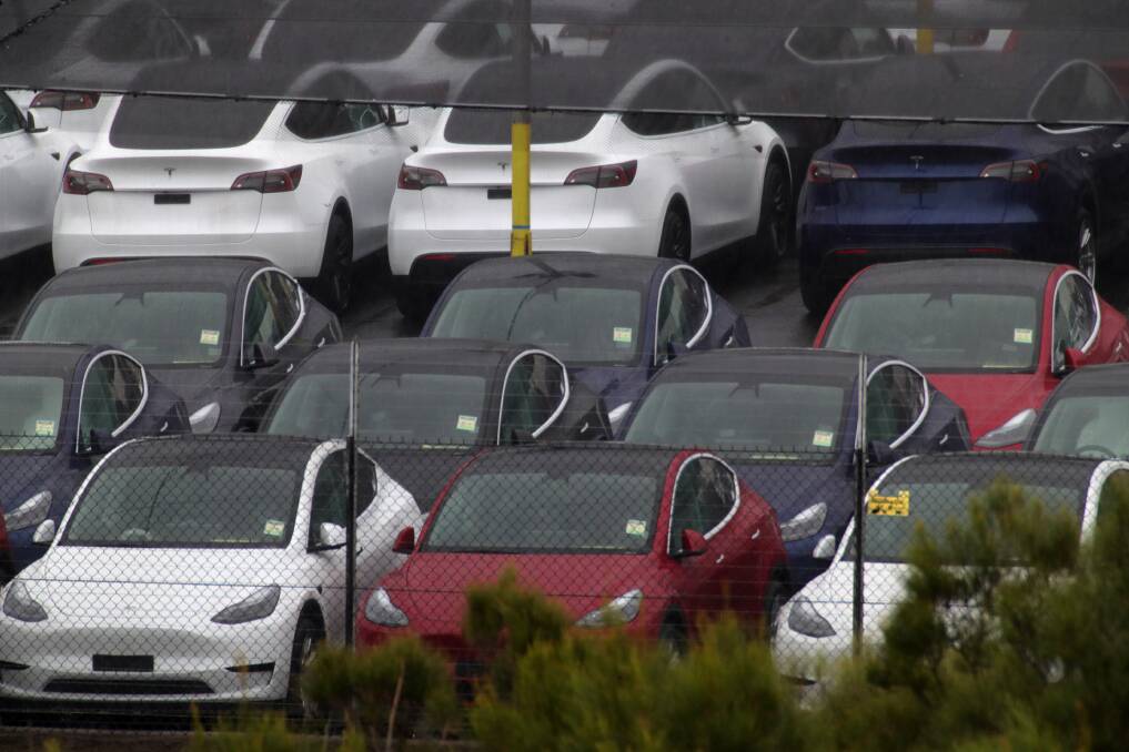 A yard at Port Kembla, pictured Thursday afternoon, is full of Teslas awaiting transport to their new owners. Picture: Sylvia Liber 