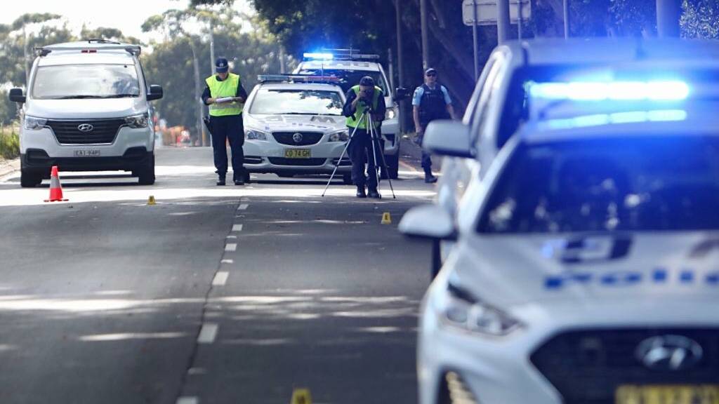 Police tend to the crime scene on Springhill Road on November 10. Picture: Adam McLean 