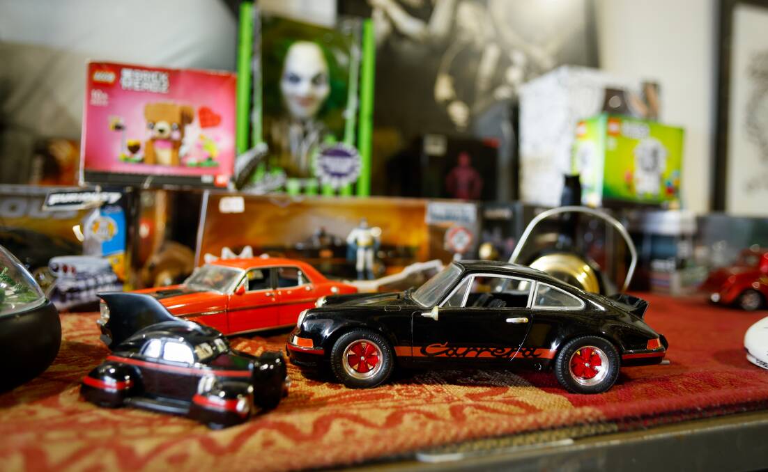 A picture taken at Port Kembla's Little Shop of Things shows a selection of miniature cars on sale. Picture: Anna Warr