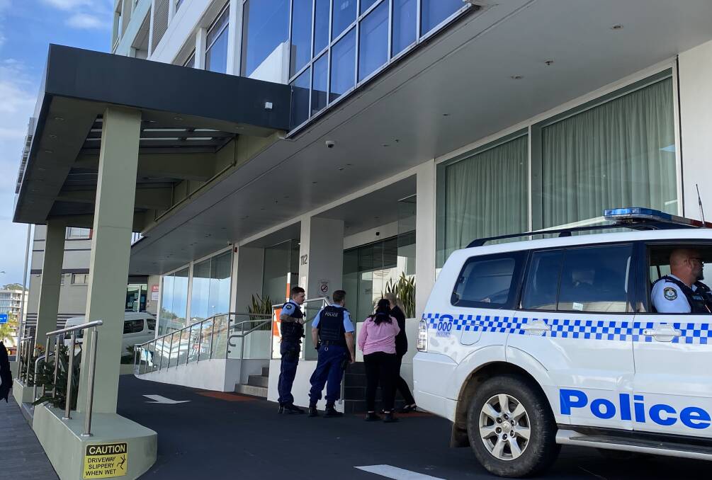 Staff greet police arriving at the hospital on Wednesday morning. 