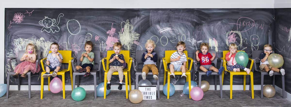 Terrible twos: Toddlers now, chairs and props keep the children put long enough for the shutter to close. Picture: Anna Warr 