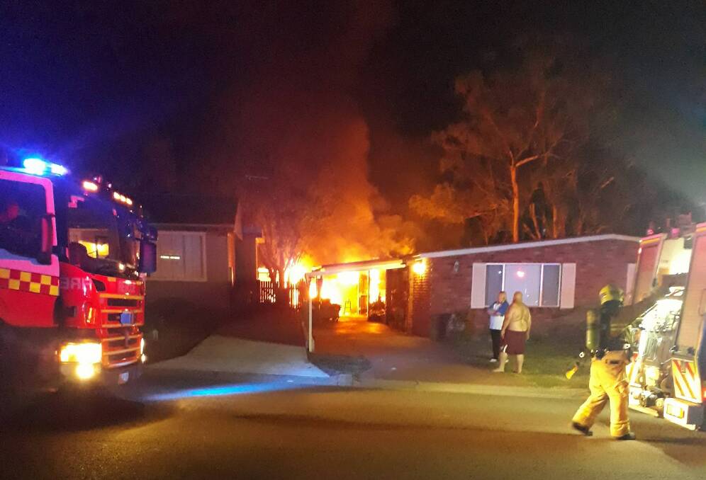 DANGER: The rear garage is destroyed in the blaze. Picture: Vicki Streatfeild