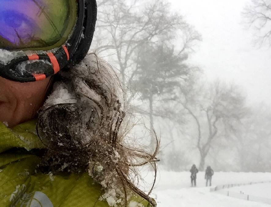 A snow-covered Renee Bartsch arrives at Central Park. 