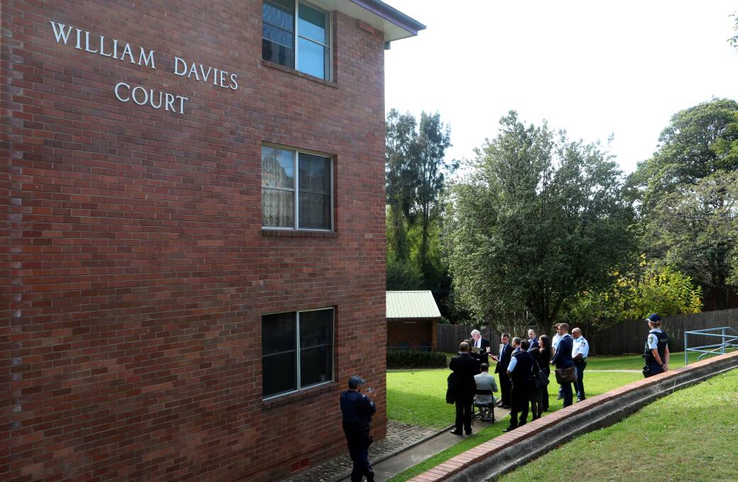 Supreme Court Justice Peter Hamill is among a gathering of court officials during a visit to the Crana Place complex last month, in an earlier chapter of Mark Jenkin's judge-alone trial. Picture: Sylvia Liber